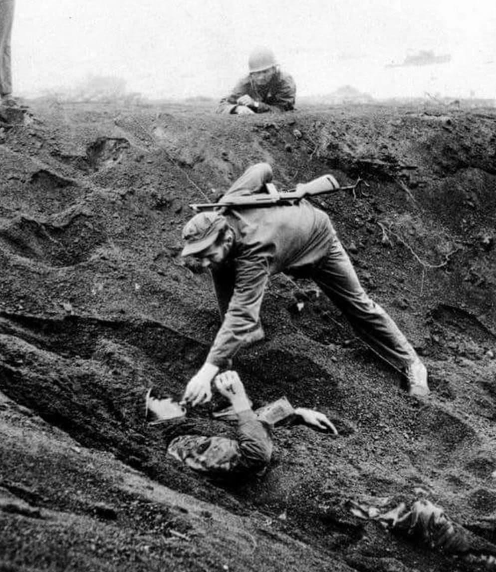 us marine gives a cigarette buried